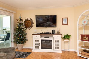 TV, fireplace, DVD player, books - Endless Summer: Oceanfront Condo with Community Pool, Picnic Area (Oak Island)