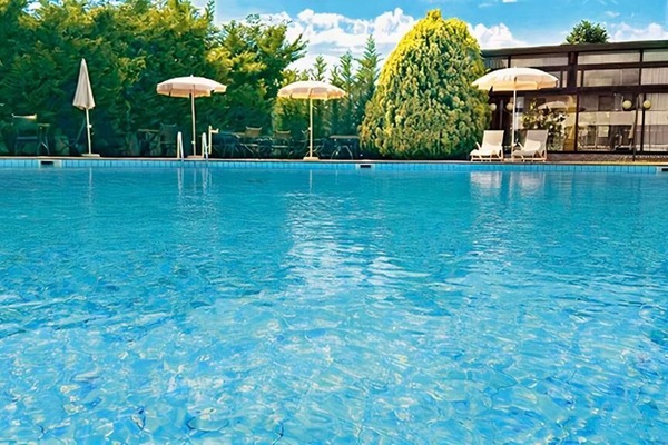 Seasonal outdoor pool, pool umbrellas, pool loungers