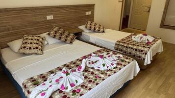 Standard Triple Room | Premium bedding, blackout curtains, soundproofing, free WiFi