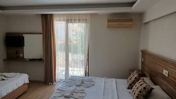 标准三人房 | 高档床上用品、遮光窗帘、隔音、免费 WiFi