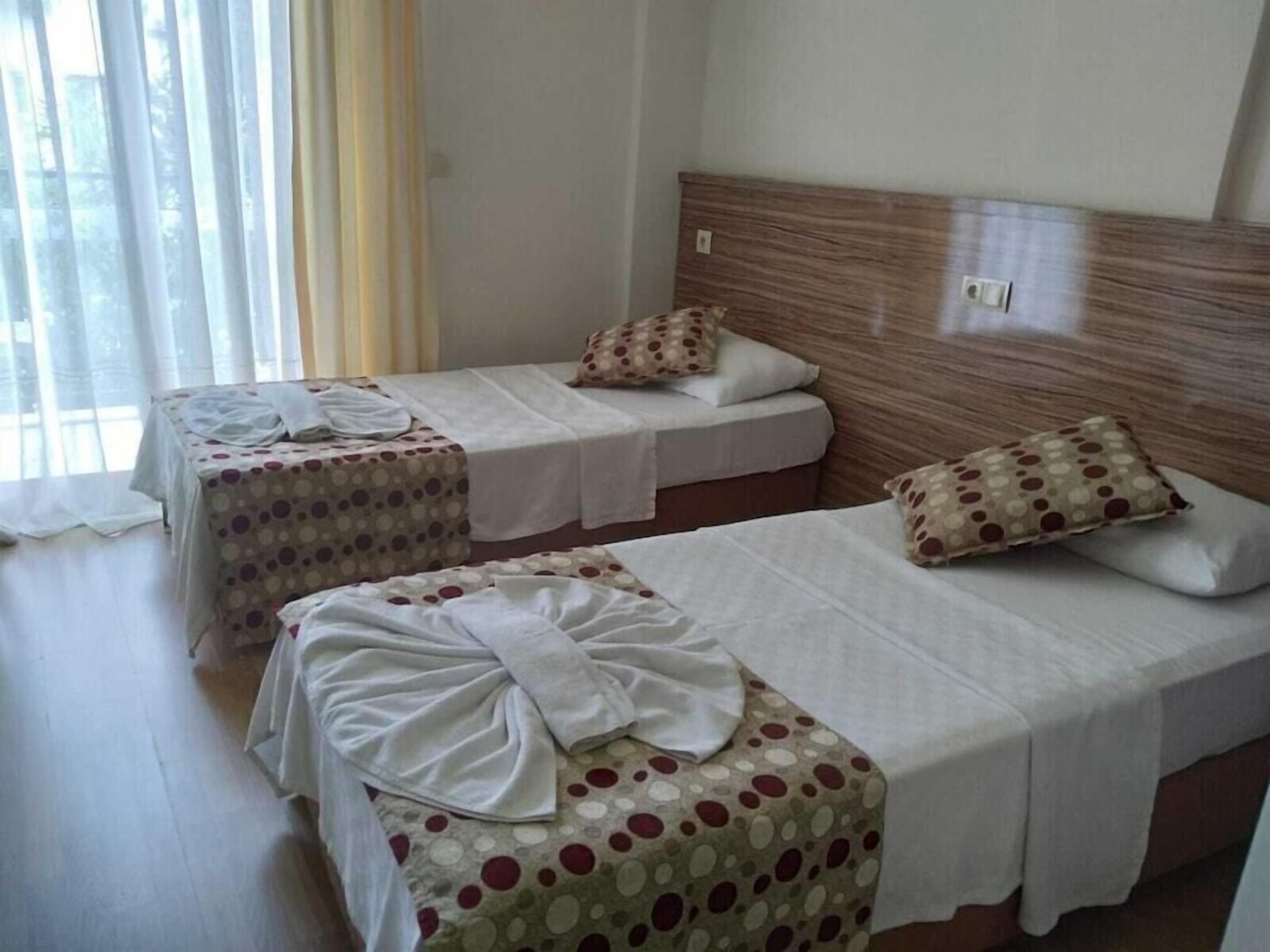 Premium bedding, blackout curtains, soundproofing, free WiFi