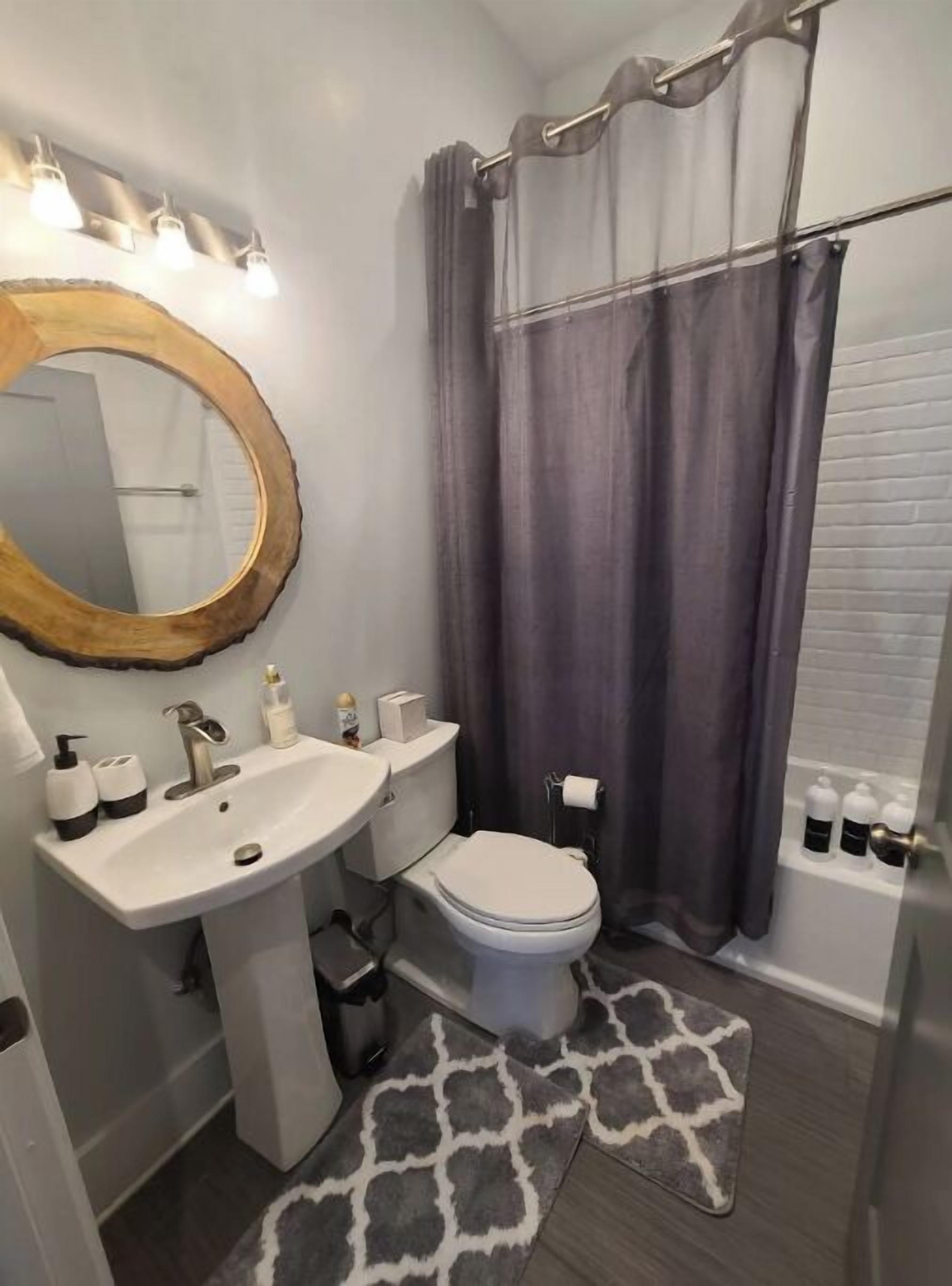 Bathtub, hair dryer, towels, soap