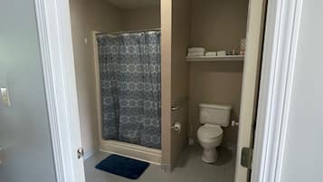 Shower, towels, soap, shampoo