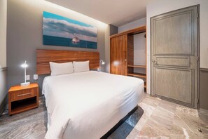 2 chambres, coffres-forts dans les chambres, fer et planche à repasser