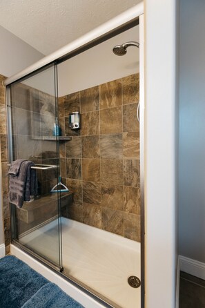 Combined shower/tub, hair dryer, towels, soap