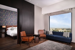 Suite, 1 King Bed | 1 bedroom, in-room safe, individually furnished, desk