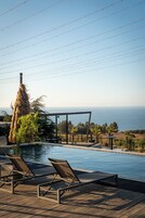 2 outdoor pools, open 9:00 AM to 10:00 PM, sun loungers