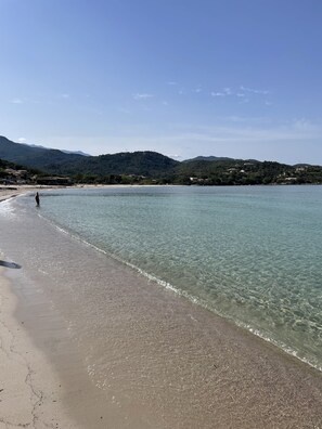 On the beach, sun loungers