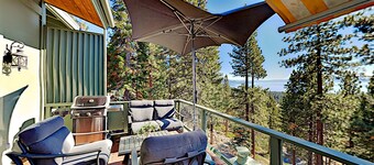 Custom, luxe condo with panoramic lake/mountain views & fireplaces