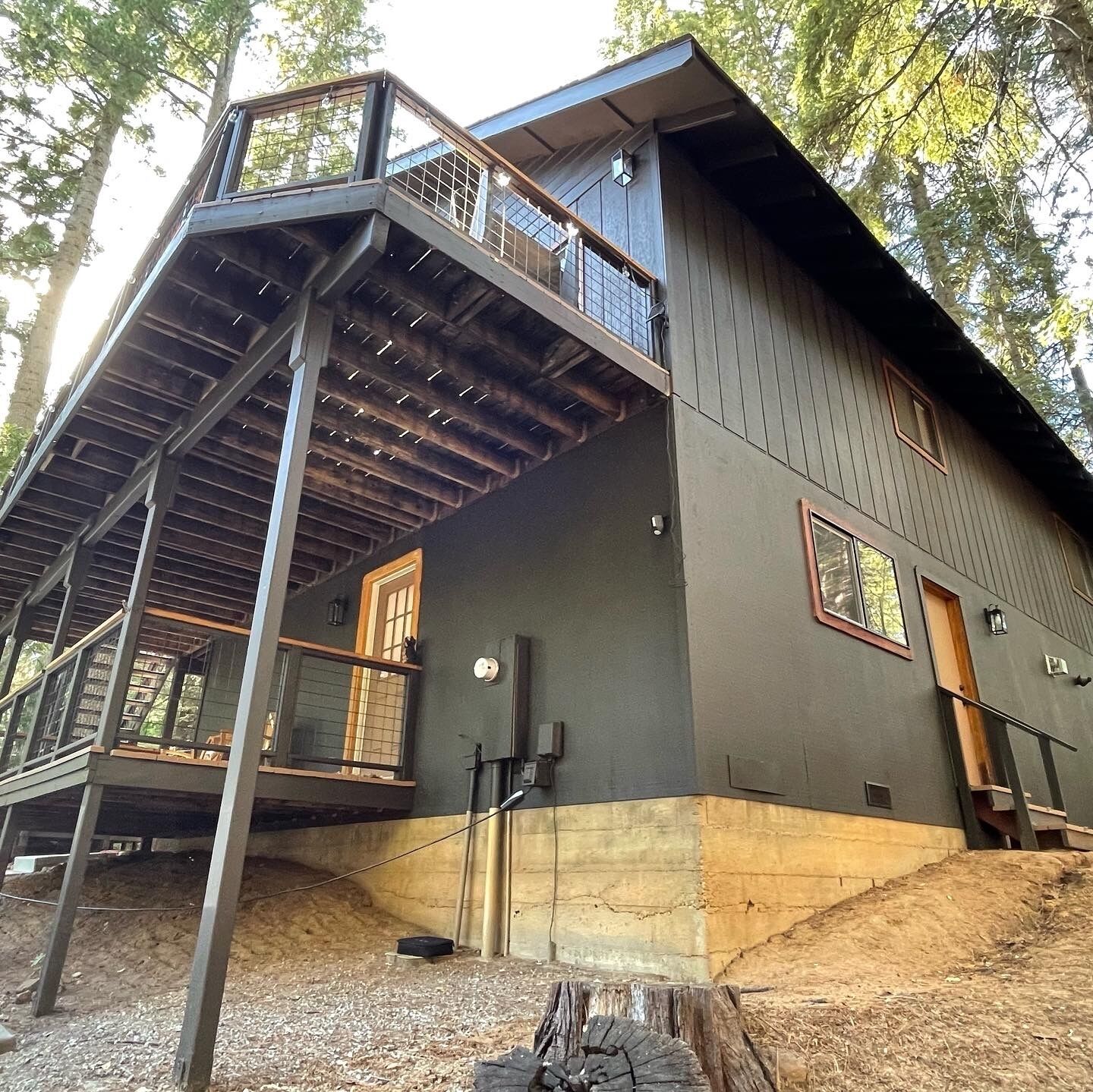 A two-story building with a balcony on the upper level.