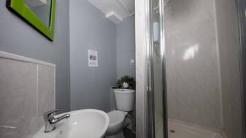 Combined shower/bathtub, hair dryer, towels, soap