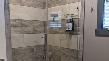 Shower, hair dryer, towels, soap