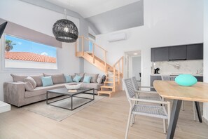Boutique Apartment AZUL | Living area | Fireplace