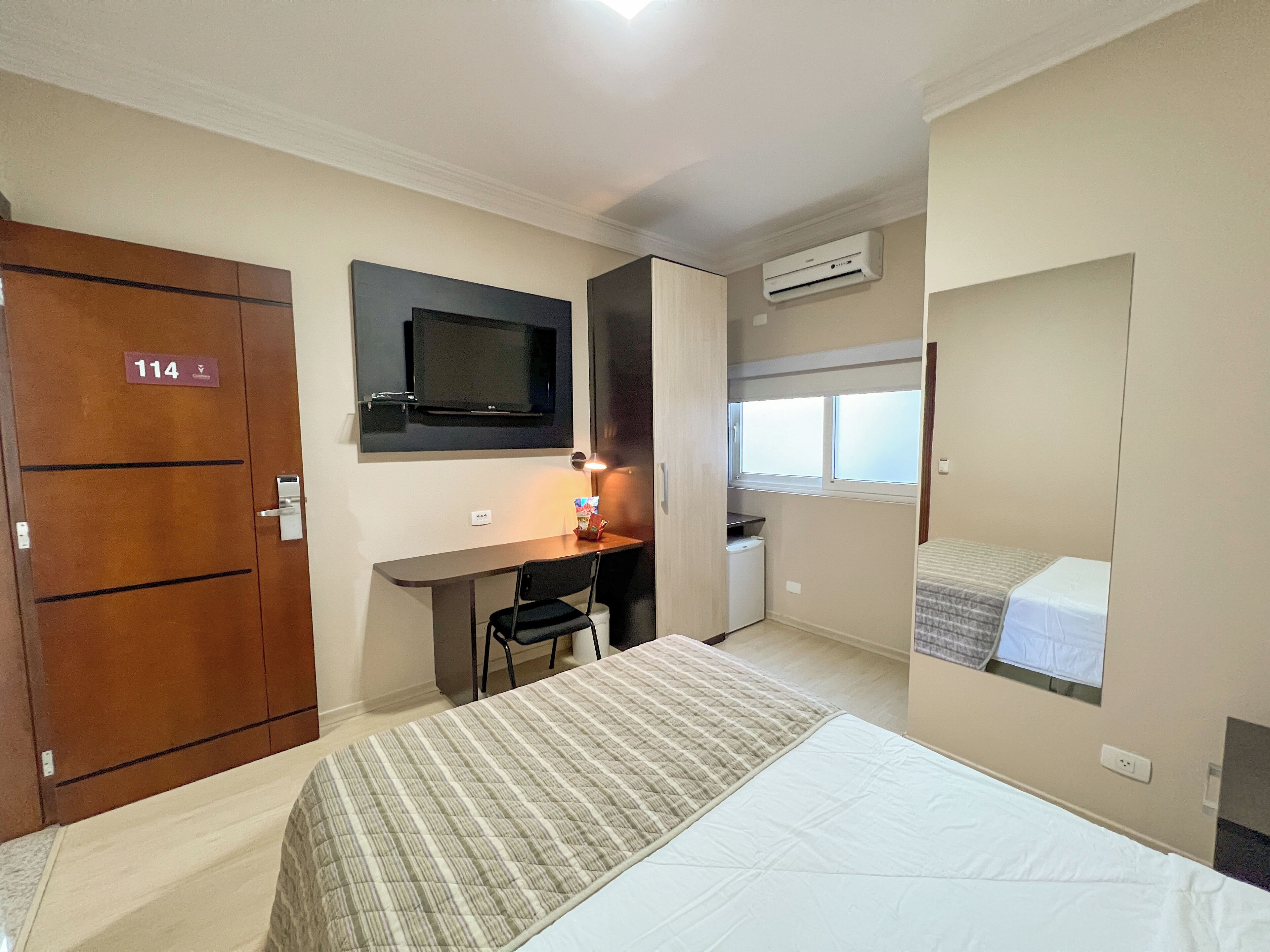 Minibar, desk, laptop workspace, blackout curtains