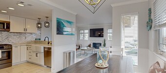 Redesigned all-suite retreat steps from beach with fireplace, AC & EV charger