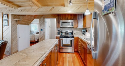 Chic Carnelian Bay cabin with wraparound deck - two blocks to the lake