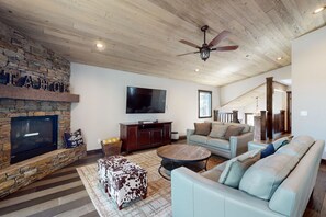 TV, fireplace, video game console, table football - Chic Meyers Home with Fenced Yard | Walk to Eateries, Parks & Lake Baron (South Lake Tahoe)