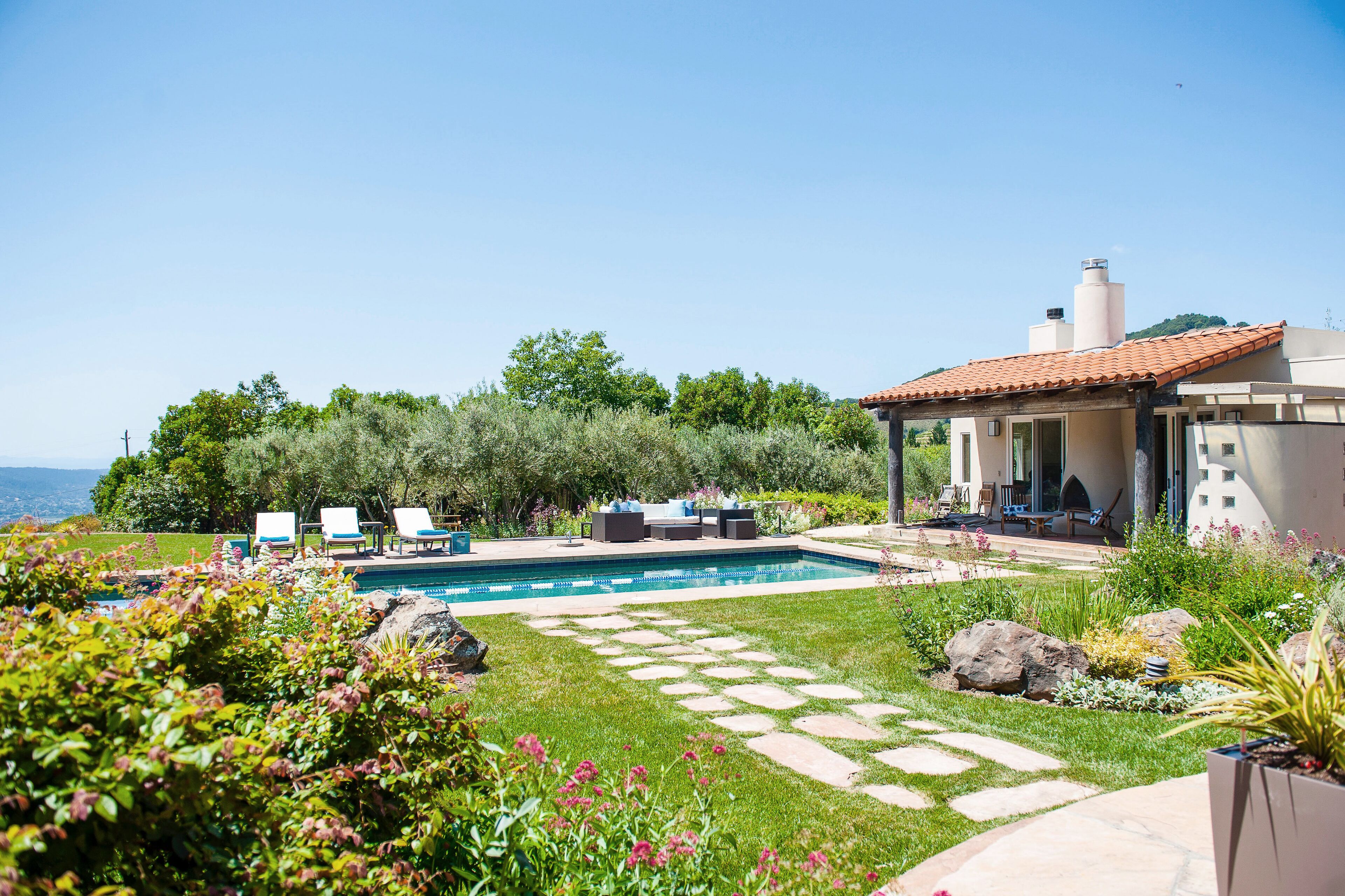 Lush estate amid acres of vineyards, designer decor, gardens, pool & bonus space