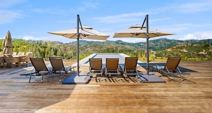 Exquisite modern getaway with private hot tub & pool + large deck w/valley-view