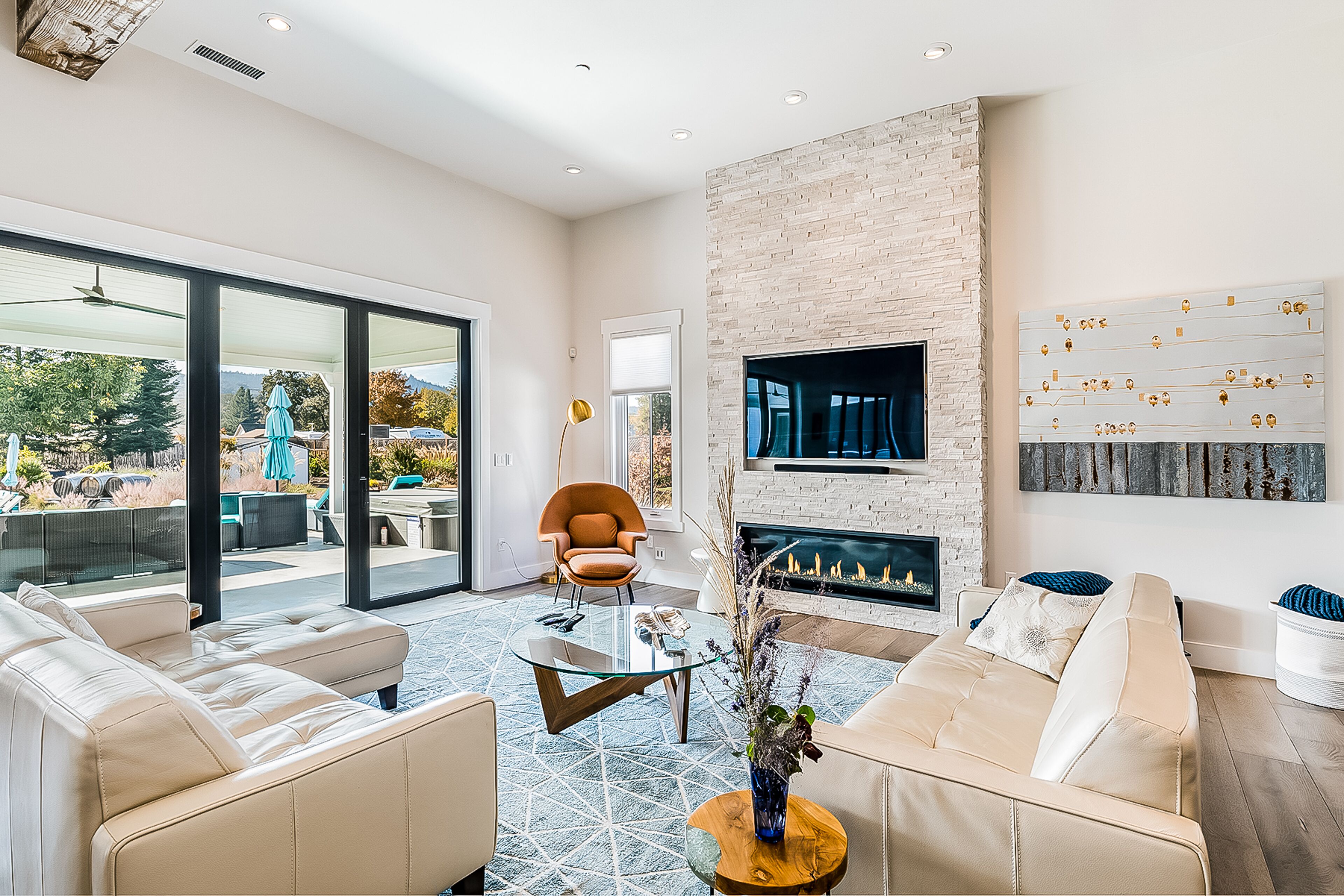 Lavish wine country estate with pool, hot tub, & vineyard in backyard oasis
