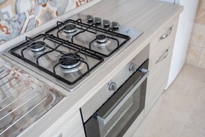 Fridge, oven, cookware/dishes/utensils, dining tables - Bea Apartment | 2 bedrooms house, wifi, a/c (Porto Cesareo)