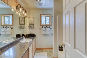 Shower, hair dryer, towels, shampoo