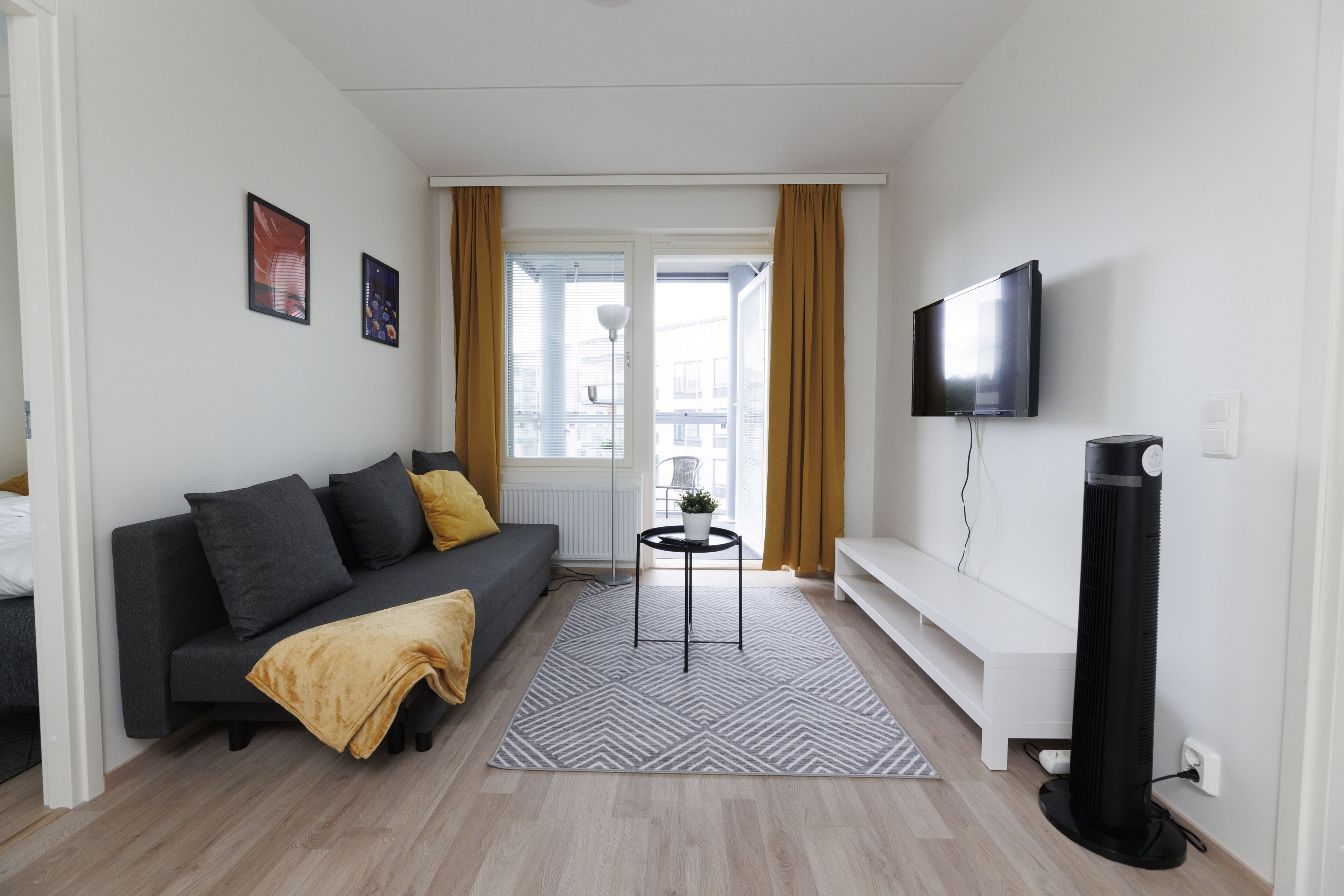 Standard Apartment, 2 Bedrooms | Living area | 40-inch LED TV with cable channels, TV