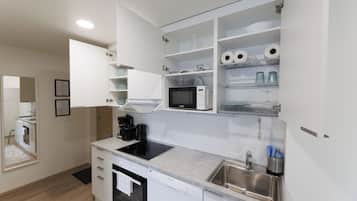 Standard Apartment, 2 Bedrooms | Private kitchen | Full-size fridge, microwave, oven, stovetop