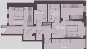 Grundriss eines Hotels mit einer Master Suite, eigenem Badezimmer zur Master Suite, Küche und Wohn-/Essbereich.
