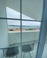 Standard Room, Sea View | Minibar, laptop workspace, iron/ironing board, free cribs/infant beds