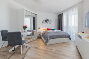 Desk, iron/ironing board, travel crib, WiFi