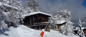 Large chalet on piste in a small Pyrenean ski resort