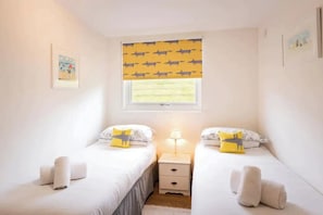 2 slaapkamers, een strijkplank/strijkijzer, beddengoed