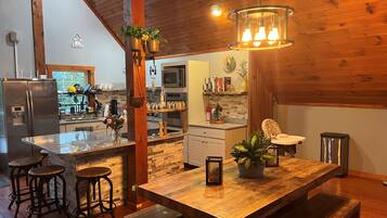 Coffee/tea maker, fridge, microwave, oven