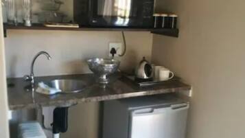 Mini-fridge, microwave, electric kettle