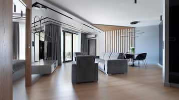 Exclusive Apartment | Living area | 50-inch plasma TV with cable channels, TV