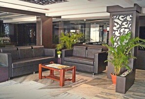 Coin salon dans le hall