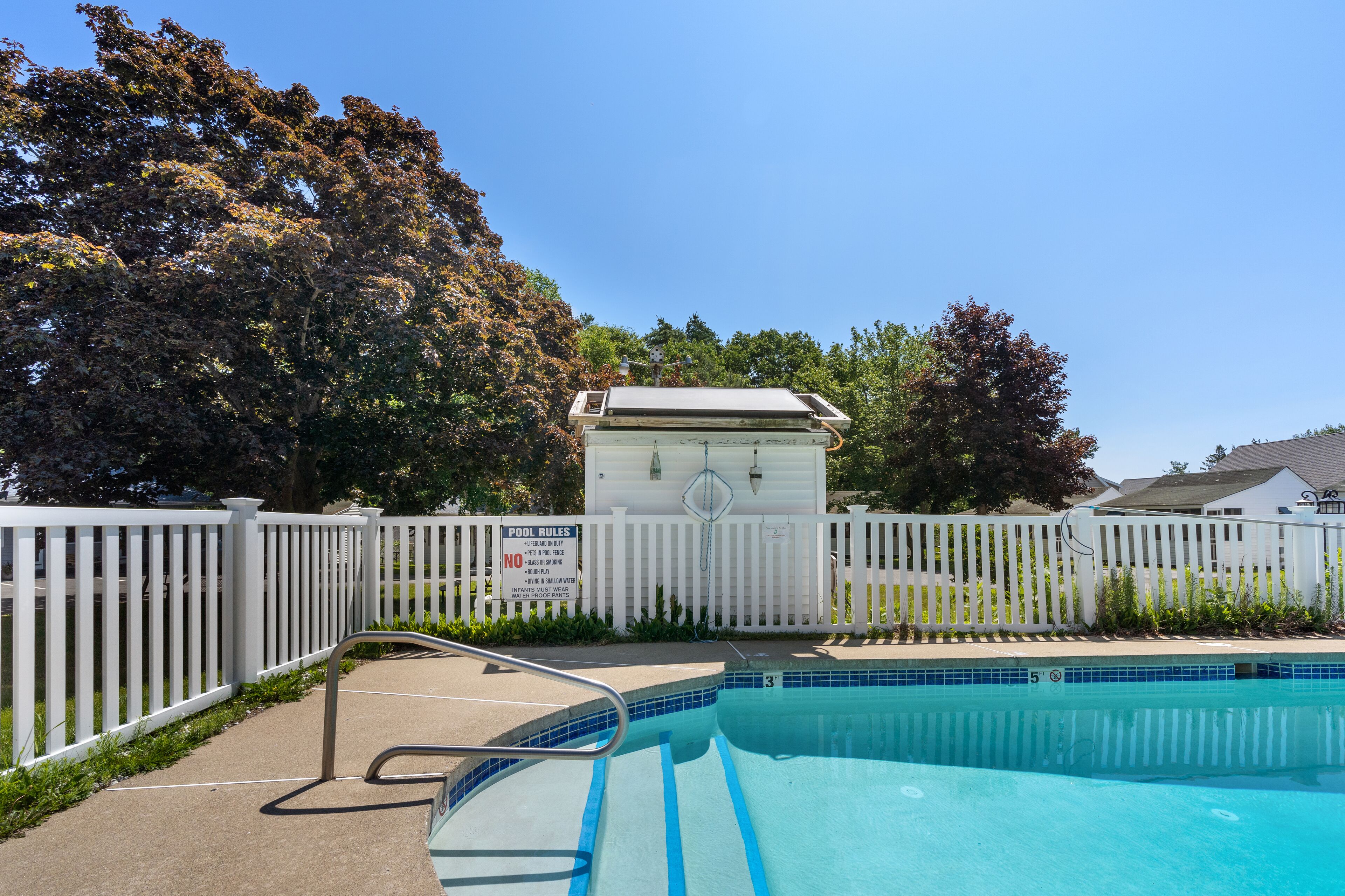Seasonal outdoor pool, pool umbrellas, pool loungers