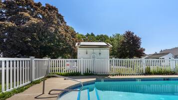 Seasonal outdoor pool, pool umbrellas, pool loungers