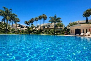 Outdoor pool, a heated pool - StayatSas apt Marbella, walking to beach, 260 ft terrace, swimming pools, garage (Nueva Andalucia, Marbella)