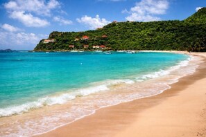 On the beach, sun loungers