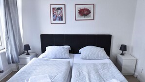1 chambre, fer et planche à repasser, Wi-Fi, literie fournie