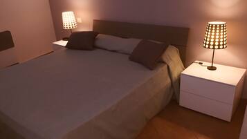 1 bedroom, desk, iron/ironing board, travel cot