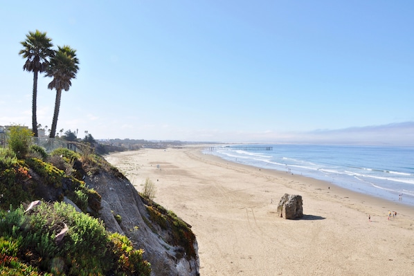 Guests can enjoy stunning ocean views from the pier, with the beach and surrounding landscape visible from this scenic spot.