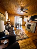 Premier Cottage | Living area | 39-inch LED TV with cable channels, TV, fireplace
