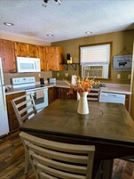 Signature Cottage, 2 Bedrooms | Private kitchen | Full-size fridge, microwave, oven, stovetop
