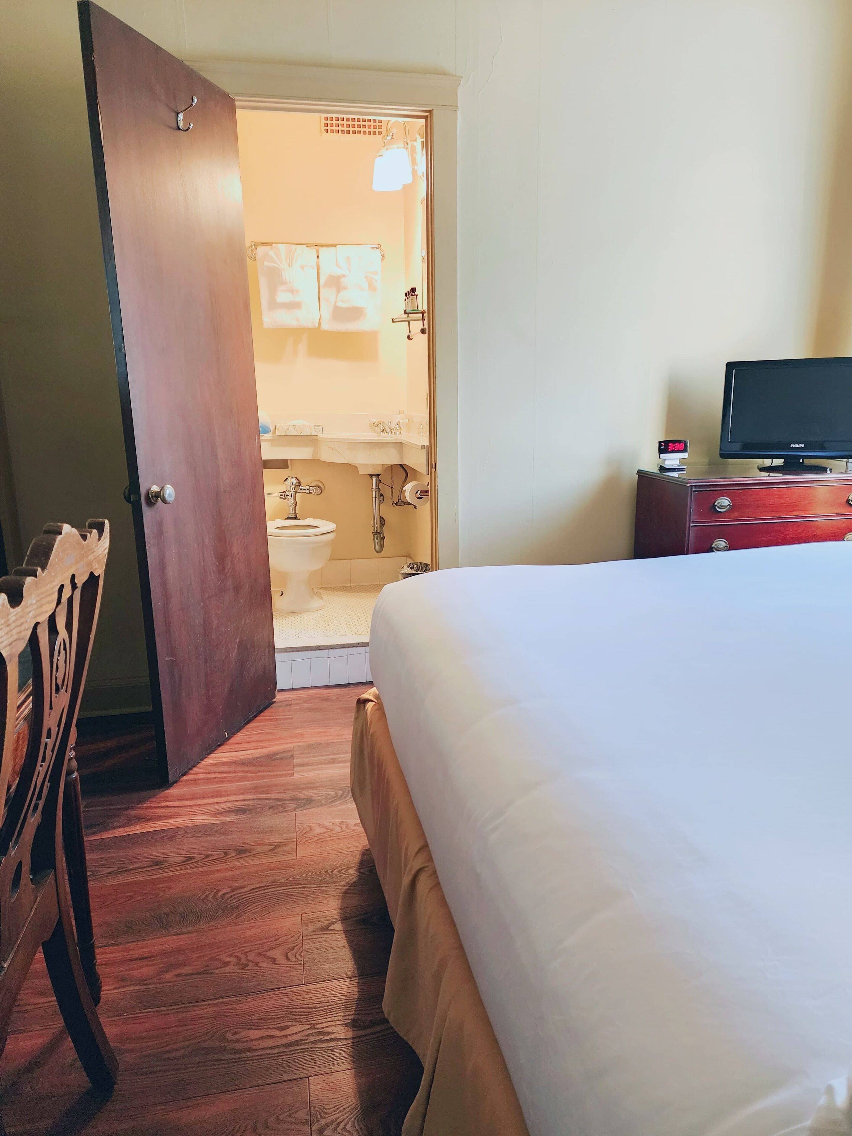 room, 1 queen bed | bathroom | hair dryer, towels, soap, shampoo