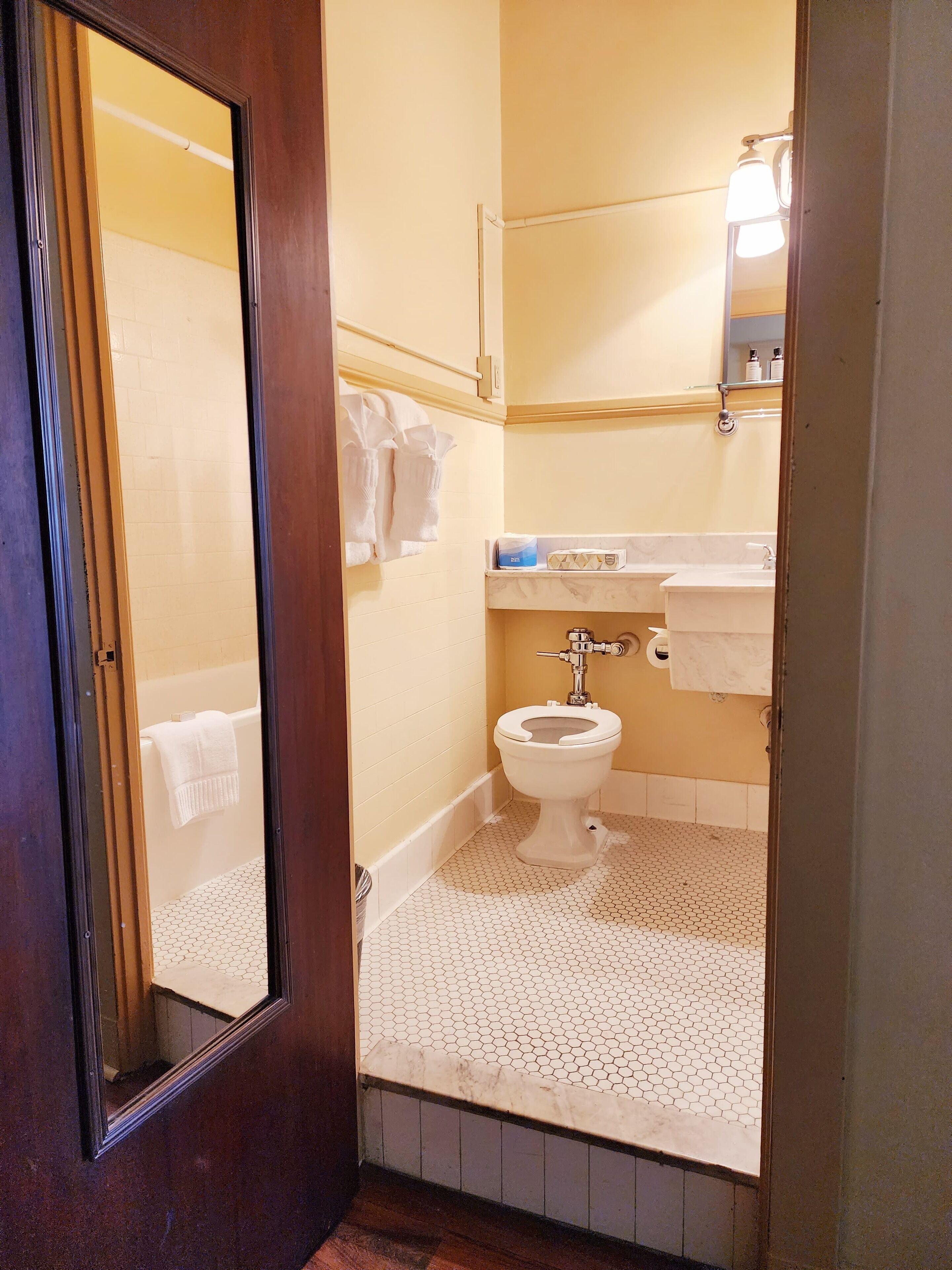 room, 1 king bed | bathroom | hair dryer, towels, soap, shampoo