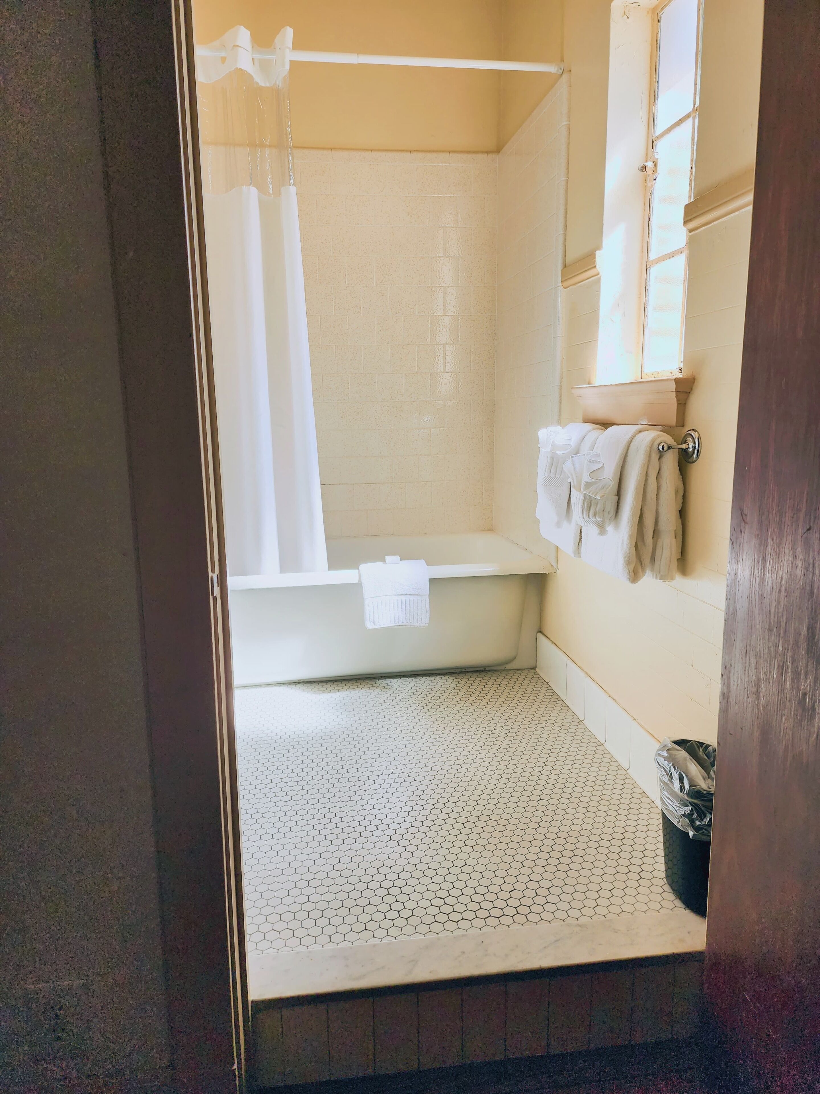 double room, 2 double beds | bathroom | hair dryer, towels, soap, shampoo