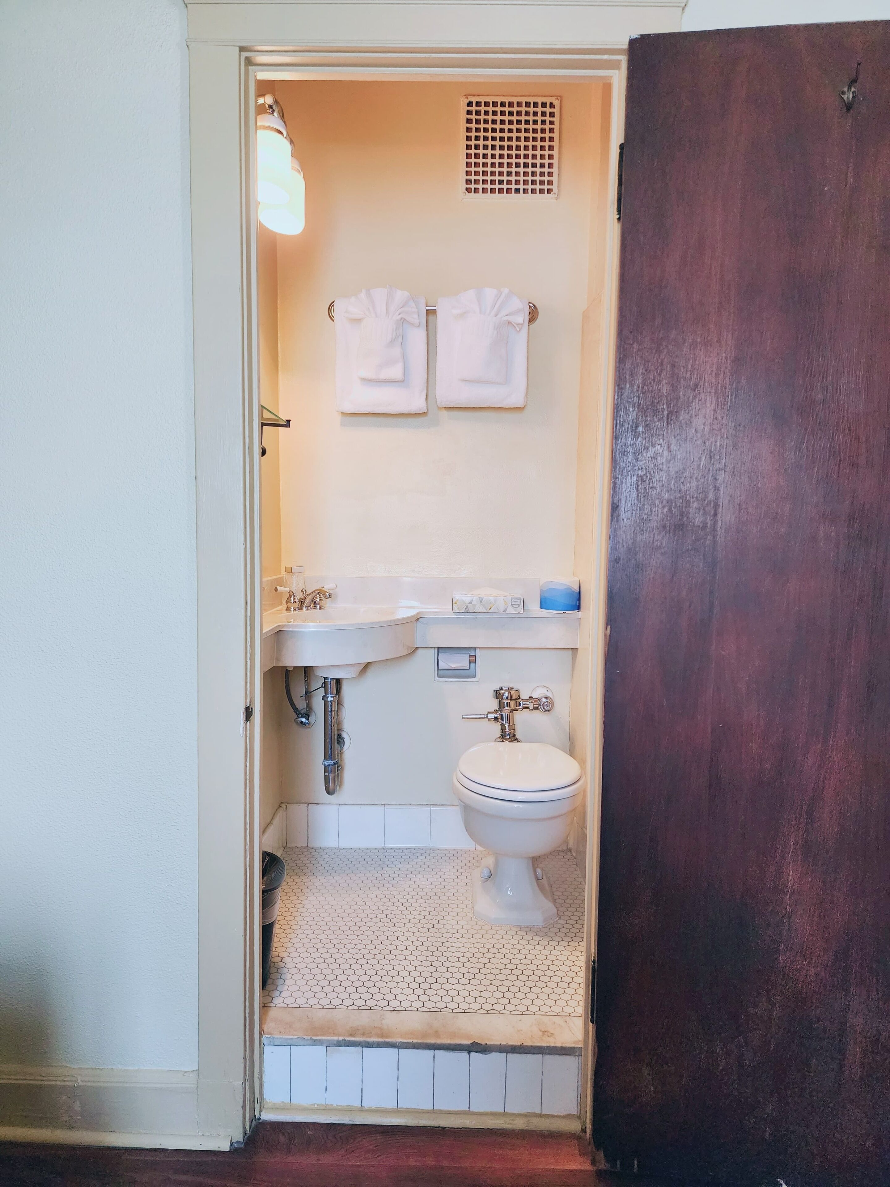 room, 1 queen bed | bathroom | hair dryer, towels, soap, shampoo